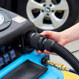 Detailer connecting the Cuff-Lynx vacuum hose to the Mytee HP120 Grand Prix extractor